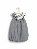 Elise Fay toddler bubble dress in black and white gingham check with a ruffled white collar and decorative bow.