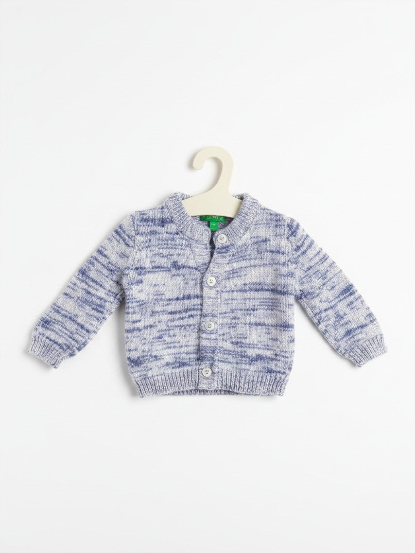 Elise Fay baby cardigan in a white and purple space-dyed knit with a button-down front and ribbed trim.